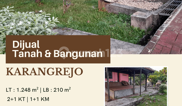 RUMAH DENGAN TANAH YG LUAS GARASI 3 MOBIL