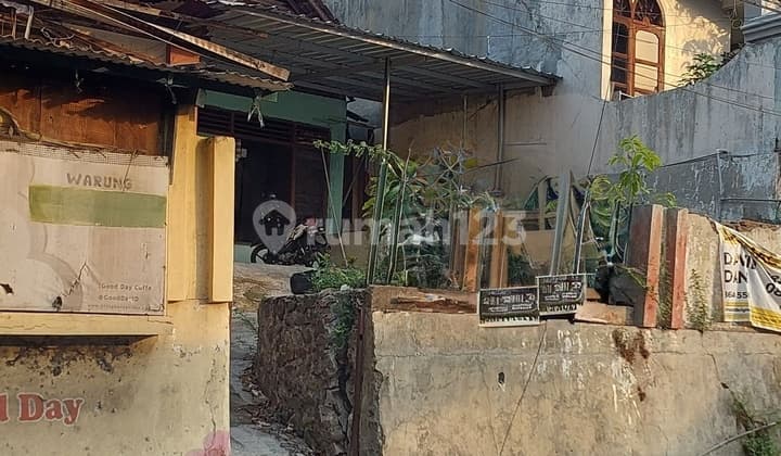 RUMAH TENGAH KOTA