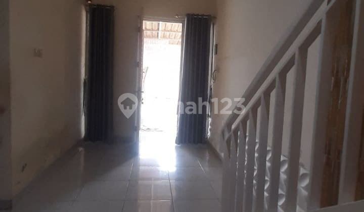 Rumah Bangunan Baru Jual Miring di Mutiara Gading City