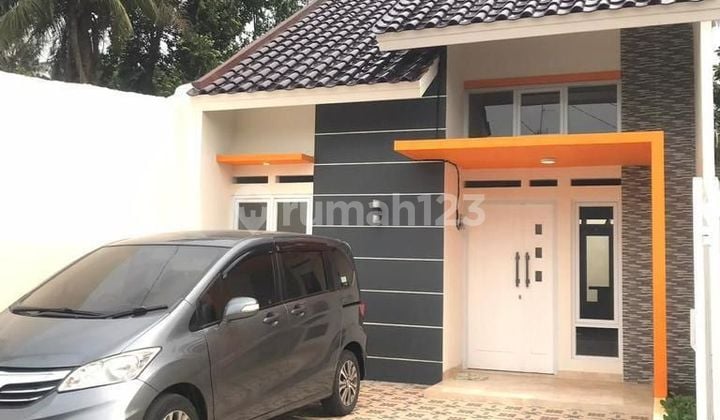 Rumah Baru 1,5 Lantai di Kodau Dekat Tol Jati warna Bekasi