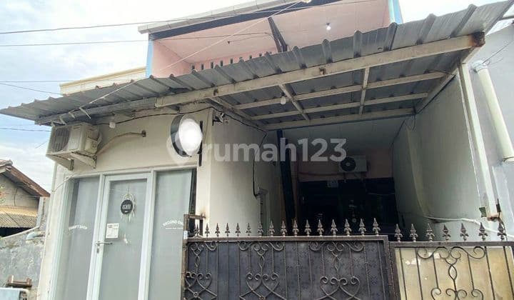Dijual Cepat Rumah Plus Toko Dua Lantai di Jatiwaringin Pondok Gede