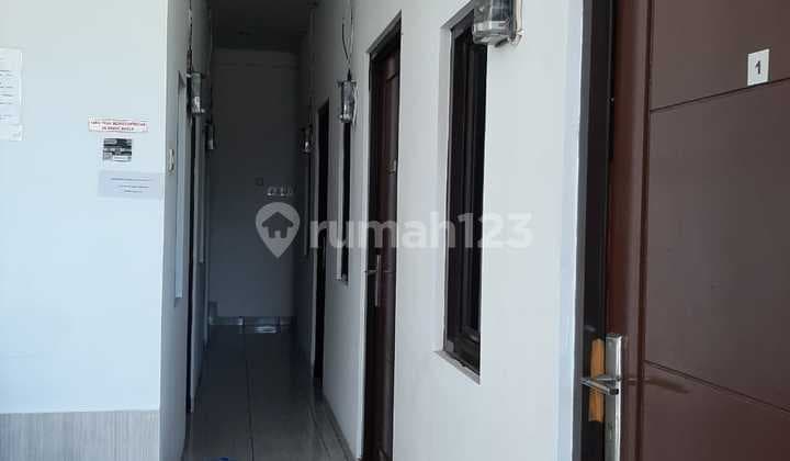 DIJUAL RUMAH KOST LOKASI STRATEGIS, POTENSI INVESTASI TINGGI DI TANJUNG DUREN, JAKARTA BARAT