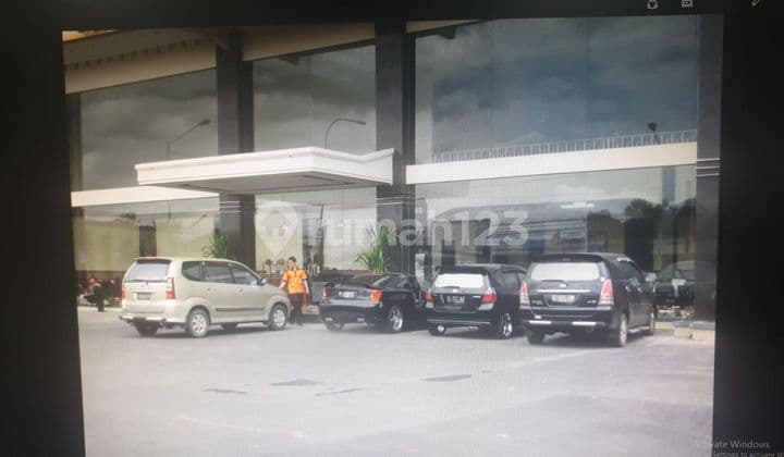 GOR and shop houses on the main road Soekarno Hatta.