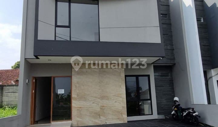 Rumah 2 Lantai Minimalis Modern Sayap Setra Duta