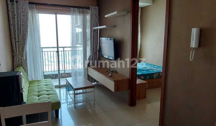 DISEWAKAN TAHUNAN CONDOMINIUM 1BR FULLYFURNISH LANTAI TINGGI VIEW KOTA