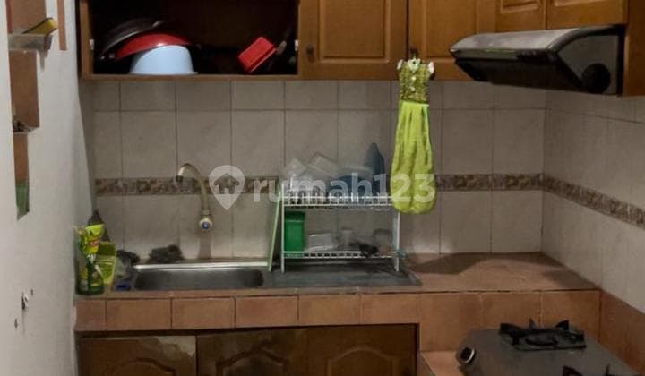 For quick sale: A well-maintained 2-story house, fully furnished and flood-free, located in Taman Palem Lestari, Cengkareng, West Jakarta.