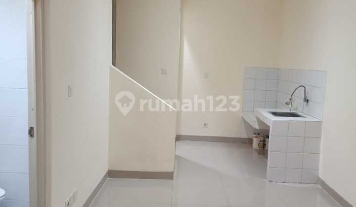Modern Minimalist House for Rent, Ready to Occupy, Unfurnished at Palm Blossom Taman Surya, West Jakarta
