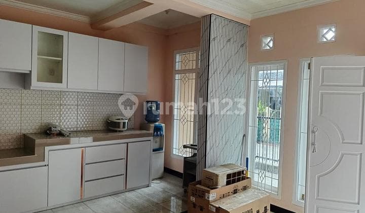 Rumah Bagus Minimalis Semi Furnished Siap Huni di TCI 1