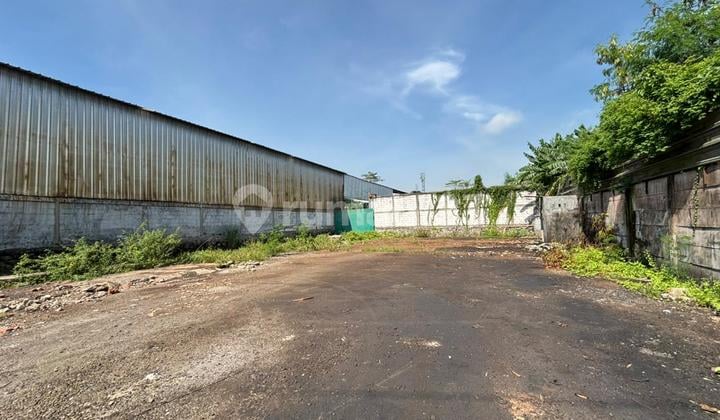 For Sale Commercial Land on Setu Main Road, 640m², Suitable for Business Premises, Clinics, Banks, Offices, Shophouses, Workshops, or Warehouses, Certified Title, Direct Access 1km to Setu Utara Toll Road, Accessible for 40-Foot Containers, 2km from Grand Wisata Gate, Cibuntu.