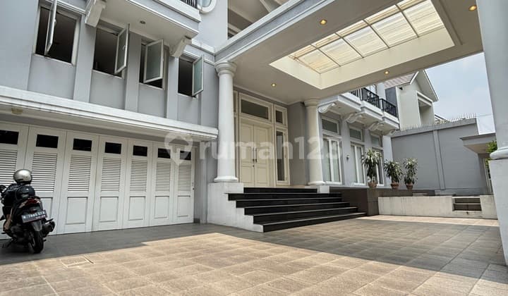 For Rent/Lease Beautiful American Classic House Ready to Occupy Semi-Furnished Wide Yard with Swimming Pool in Kemang Dalam, South Jakarta