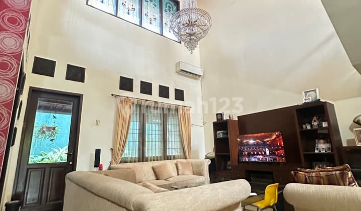 For sale. House in Pesona Khayangan Margonda located in a quiet, cool, and strategic residential area.