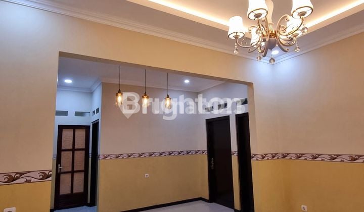 RUMAH BARU DI PUSAT KOTA