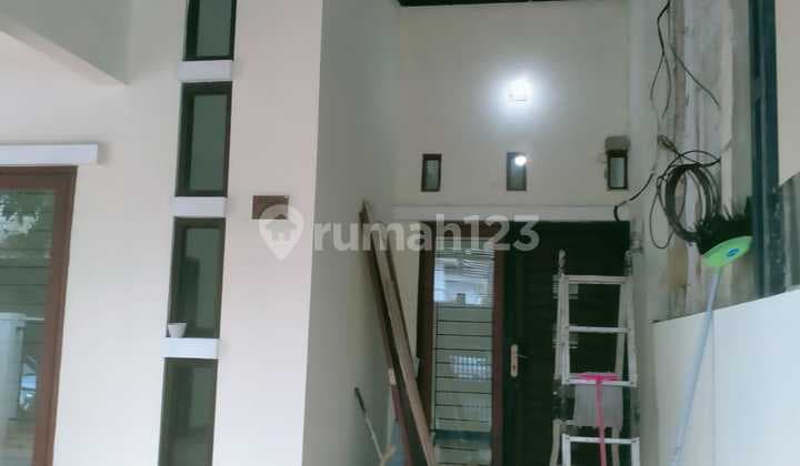 Rent 2-Story Mezzanine House Ready to Occupy Newly Renovated in Aralia Cluster, Harapan Indah