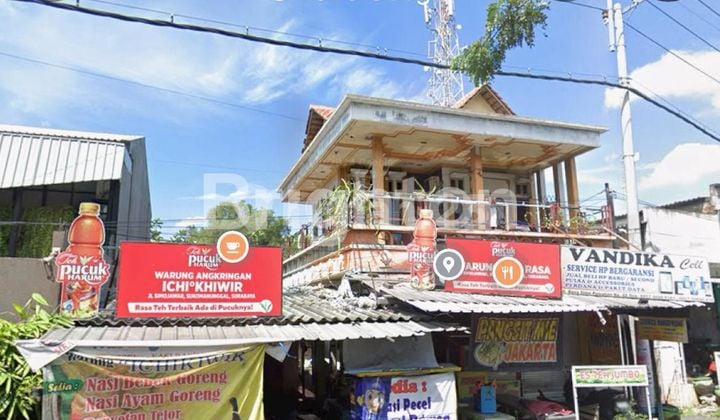 Rumah dan ruangan usaha lokasi sangat strategis