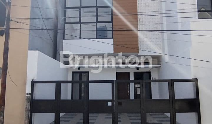 rumah baru siap huni lokasi sangat strategis dan komersial