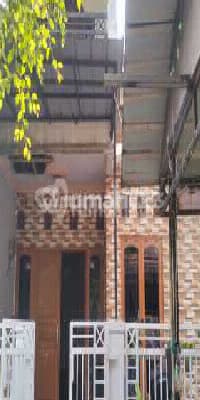 Two-story house in a quiet complex in Cimanggu, Bogor.