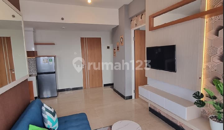 Sewa Apartemen Puncak Dharmahusada 2 Br Luas 56