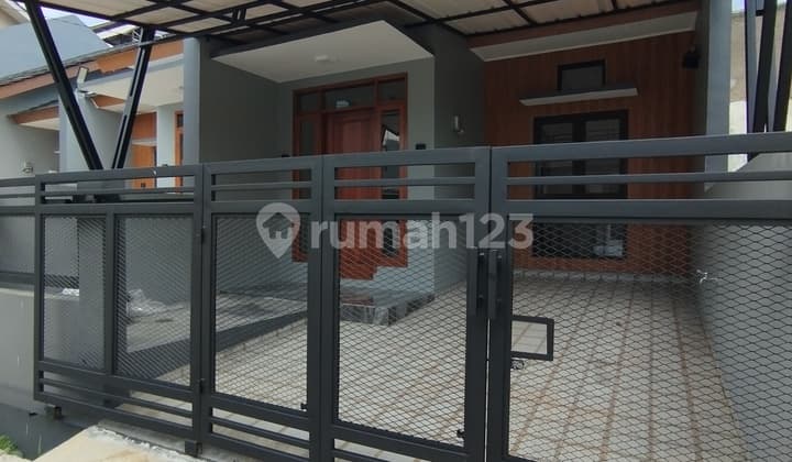 Rumah Baru Di Cisaranten Arcamanik Siap Huni 1,5 Lantaikeamanan 24 Jam Lingkungan Nyaman,aman Dan Asri Jalan Lebar,aspalspesifikasi Rumah ;luas Tanah 75 Meterluas Bangunan 80 Meter3 Kamar Tidur2 Kamar Mandi Hadap Selatan Air Siblelistrik 1300 Harga 875jt