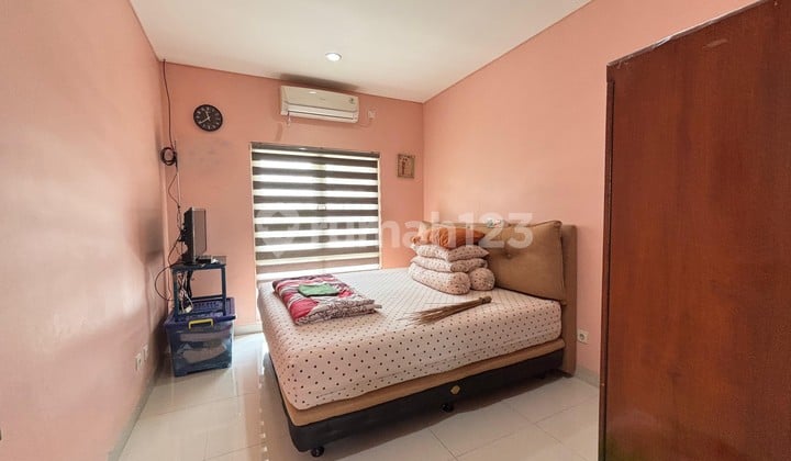 For Sale: 2-Story Familia Urban House Ready to Occupy, 3+1 Bedrooms, Dharmawangsa Cluster, Eligible for Mortgage, Close to LRT Mustika Jaya, Bekasi City.