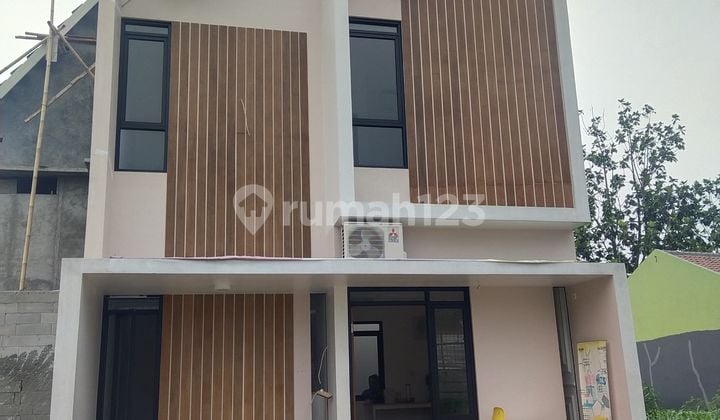Two-Story House with New SHM, North-South Facing in Kranggan, Cibubur.