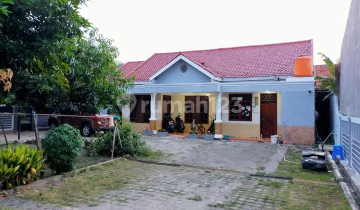 Land with building, very strategic location 446 m², SHM (Certificate of Land Ownership)
