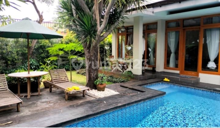 A Serene and Strategic House with a Swimming Pool in South Kemang