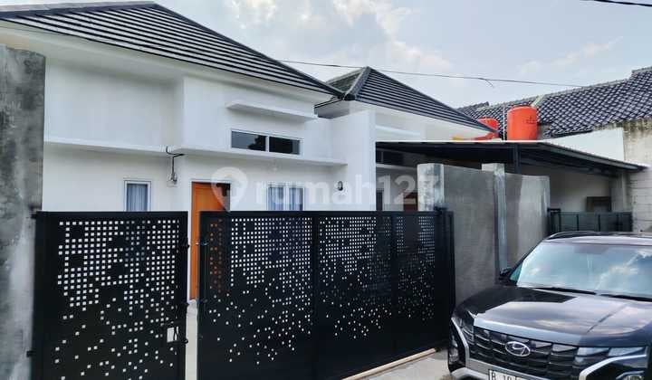 Rumah Modern Minimalis Cash Back 100 Juta di Arco Sawangan Bojongsari Depok