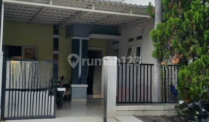 House in Front of Park Inside Cluster 2 at Harapan Indah