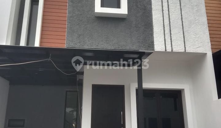 Rumah 2 lantai di jati asih fee ac dan canopy