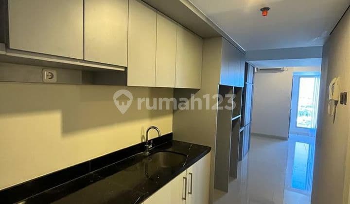 JUAL APARTEMEN LOUIS KIENE PEMUDA FURNISH TENGAH KOTA