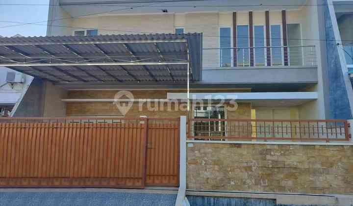 Minimalist House in Dharmahusada Indah Utara, Surabaya