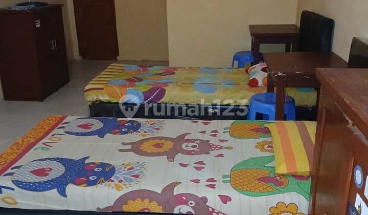 Passive Income: Fully Occupied Boarding House for Sale Near Campus