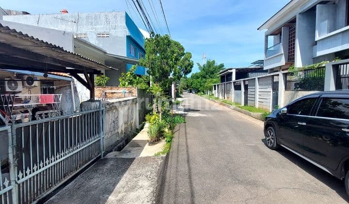 Old house with land measurement on Jl Taruma Perkasa, facing Southwest, with SHM (Certificate of Ownership) in Rawa Buaya, Cengkareng, West Jakarta.
