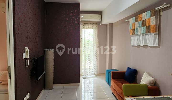 For Sale: 2-Bedroom Furnished Apartment in Excellent Condition, Ready to Occupy, with Swimming Pool View at Caldesia Tower, The Springlake Apartments, Near Summarecon Bekasi.