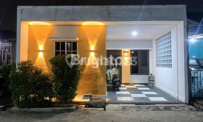 RUMAH MINIMALIS CANTIK DAN NYAMAN 1 1/2 LANTAI DI BOGOR GADING RESIDENCE