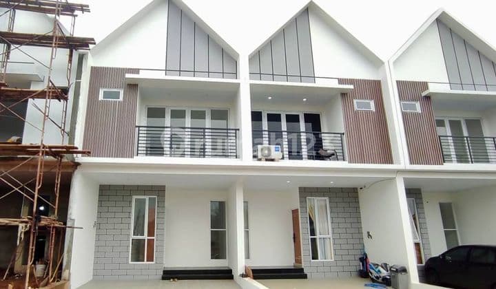 RUMAH 2 LANTAI SIAP HUNI DEKAT TOLL JATIKARYA DAN TOLL CIMANGGIS
