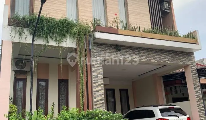 Rumah Ketintang Siap Huni Ada Kolam Ikan