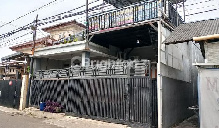 RUMAH MASIH BARU LOKASI PINGGIR JALAN RAYA