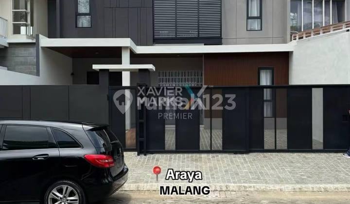 Rumah Baru Gress Tema Modern Tropis di Cluster The Araya Malang