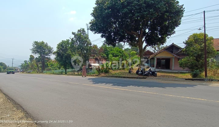 For Sale: Land with Adjacent Building on National Road