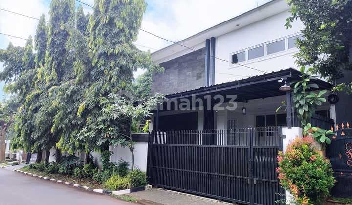 Asri House with a Spacious Well-Maintained Garden, Ready to Occupy in a Premium Neighborhood in Pamulang, Good House with SHM