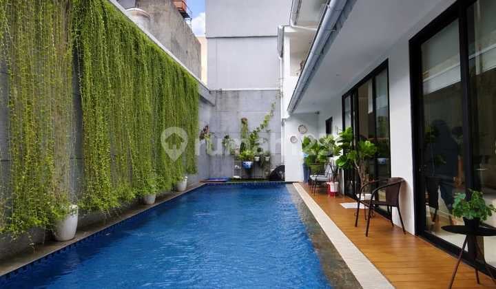 Rumah Modern dengan Kolam Renang di Riverpark Bintaro Harga Nego 17662