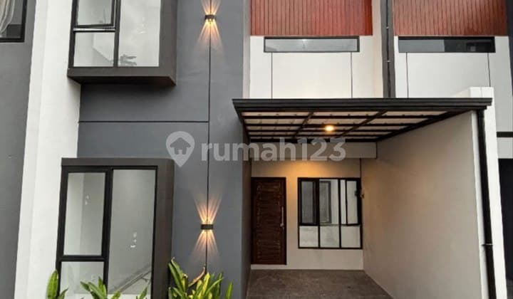 MBV335 Scandinavian House with 2 Land Titles in a Cluster Adjoining South Jakarta in Beji