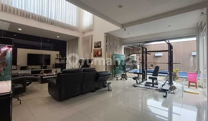 Rumah Murah 2 Lantai Semi Furnished Ada Pool SHM di Budi Indah