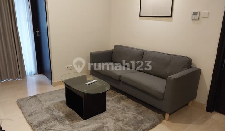 For rent Sudirman Suites apartment 72m2 2BR furnished in South Jakarta.