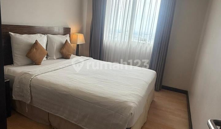 Dijual Cepat Apartemen Bagus Cantik Siap Huni Full Furnished View Kota Type 2 BR Lantai 19 Passive Income di Condotel Braga
