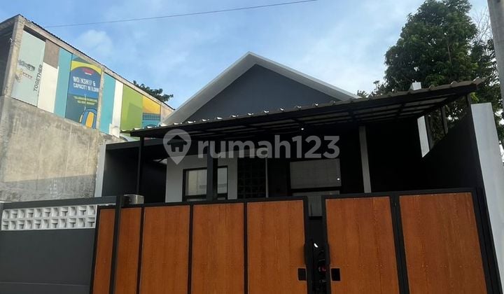 Rumah 2 kamar, ada sisa tanah samping. Cinunuk Cibiru, Bandung.