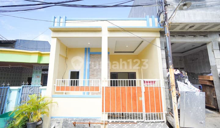 Rumah Minimalis SHM 6 Menit ke RS Taman Harapan Baru DP Ringan J28684