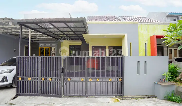 Rumah 15 Menit ke Mall Pesona Square SHM Hadap Timur Siap KPR J-29109