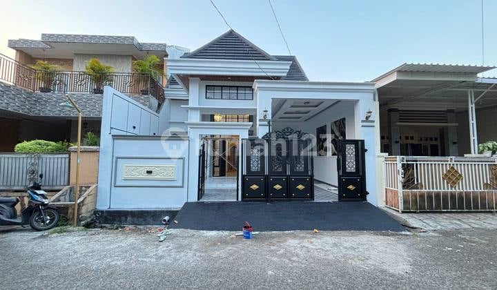 Rumah Finishing (Progres) Posisi Boulevard di Citra Indah City